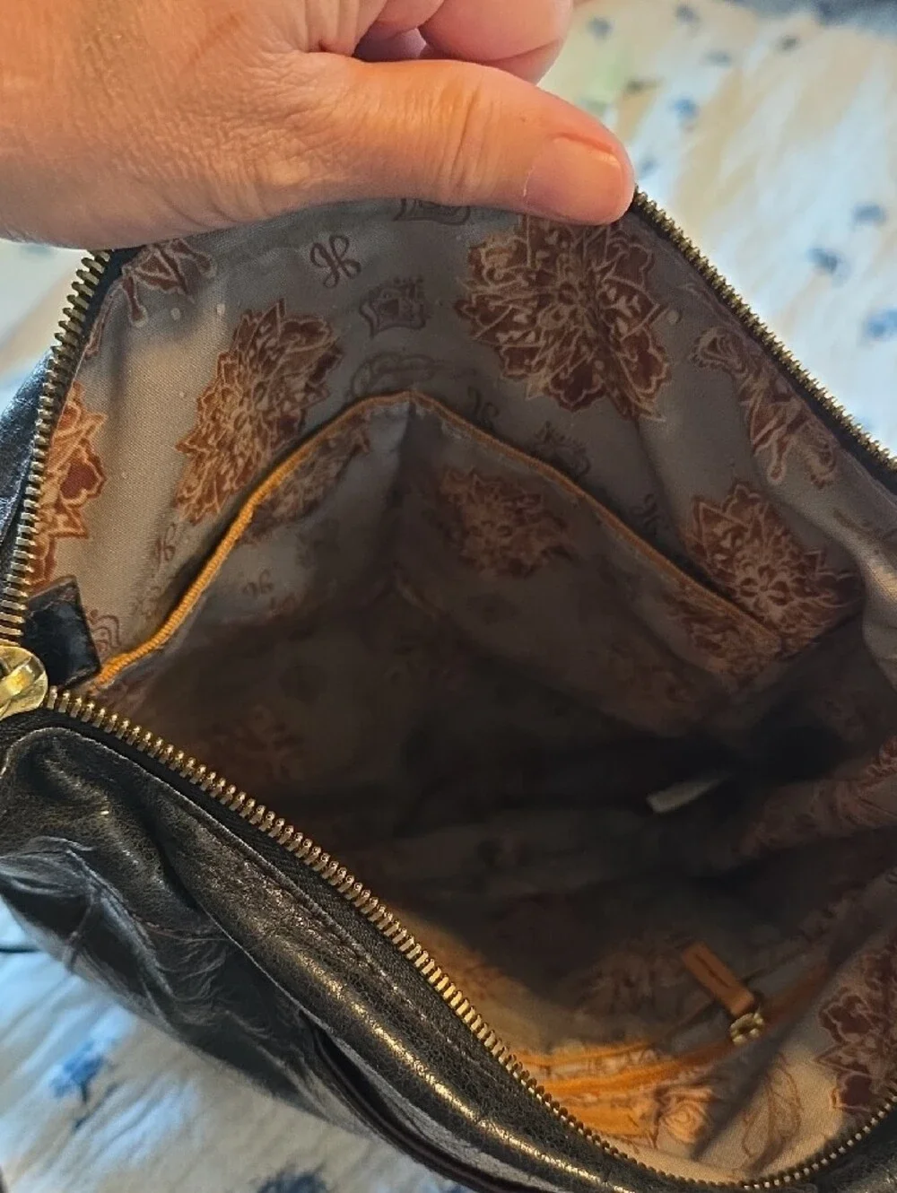 HOBO Black Leather Crossbody with Zip Accent and Decorative Adjustable Strap